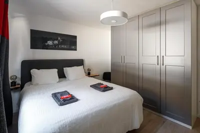 Ein Bett oder Betten in einem Zimmer der Unterkunft Magnifique appartement proche du centre et du ski
