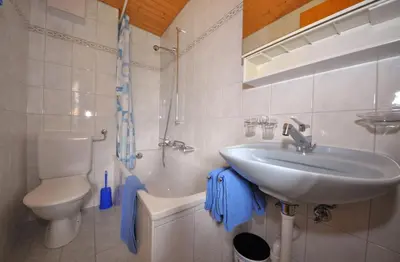 Ein Badezimmer in der Unterkunft Chalet Ideal Saas-Fee