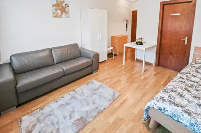 Ein Sitzbereich in der Unterkunft Studio cosy au centre de Crans-Montana