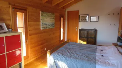 Ein Bett oder Betten in einem Zimmer der Unterkunft Le CHEMO