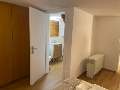 Ein Bett oder Betten in einem Zimmer der Unterkunft Chalet à Savièse en bordure de forêt