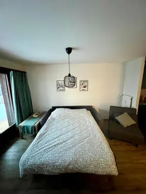 Ein Bett oder Betten in einem Zimmer der Unterkunft 2,5 pièces à Haute-Nendaz, grande terrasse, piscine, sauna, tennis