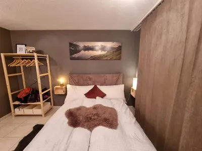Ein Bett oder Betten in einem Zimmer der Unterkunft Ski-in cosy studio