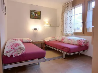 Ein Bett oder Betten in einem Zimmer der Unterkunft Apartment Laerchehus West by Interhome