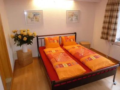 Ein Bett oder Betten in einem Zimmer der Unterkunft Hotel Restaurant Sunnmatt