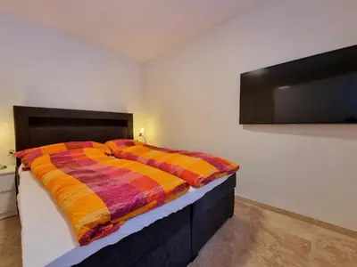 Ein Bett oder Betten in einem Zimmer der Unterkunft Zum Lerch Penthouse