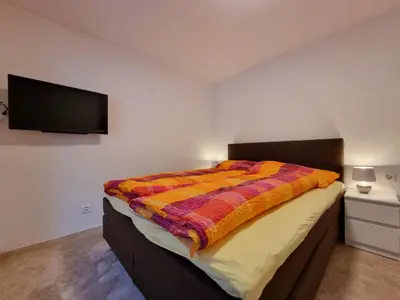 Ein Bett oder Betten in einem Zimmer der Unterkunft Zum Lerch Penthouse
