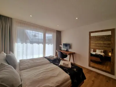 Ein Bett oder Betten in einem Zimmer der Unterkunft Berghof 2nd Floor