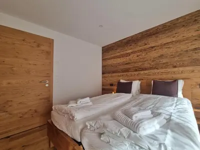 Ein Bett oder Betten in einem Zimmer der Unterkunft Berghof 2nd Floor