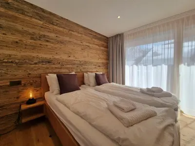 Ein Bett oder Betten in einem Zimmer der Unterkunft Berghof 2nd Floor