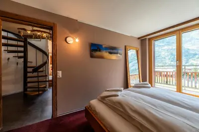 Ein Bett oder Betten in einem Zimmer der Unterkunft Duplex de charme à Zermatt