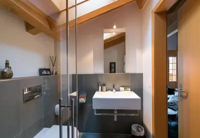 Ein Badezimmer in der Unterkunft Waldbort Penthouse