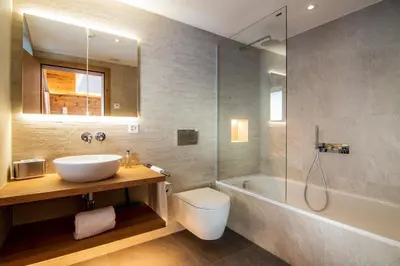 Ein Badezimmer in der Unterkunft Berghof Penthouse
