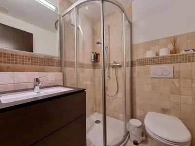 Ein Badezimmer in der Unterkunft Mountain Village Residence