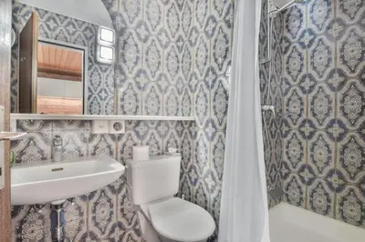Ein Badezimmer in der Unterkunft Rhodania 56