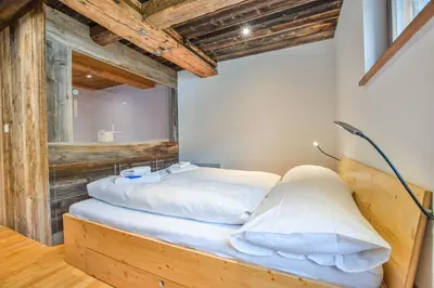 Ein Bett oder Betten in einem Zimmer der Unterkunft Bodmen 305