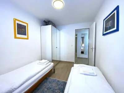 Ein Bett oder Betten in einem Zimmer der Unterkunft Steghorn 3