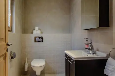 Ein Badezimmer in der Unterkunft Chalet La Gioventu - GRIWA RENT AG