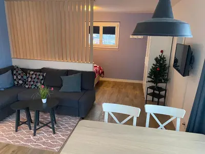 Ein Sitzbereich in der Unterkunft Spring Inn Apartments