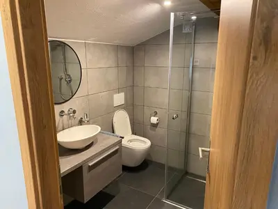 Ein Badezimmer in der Unterkunft Spring Inn Apartments