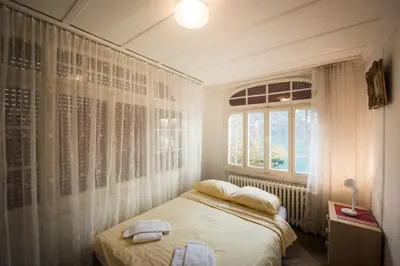 Ein Bett oder Betten in einem Zimmer der Unterkunft Alpenblume - Direct lake view