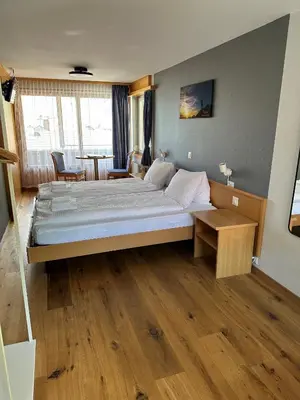 Ein Bett oder Betten in einem Zimmer der Unterkunft Hotel WALZ