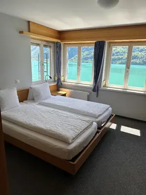 Ein Bett oder Betten in einem Zimmer der Unterkunft Hotel WALZ