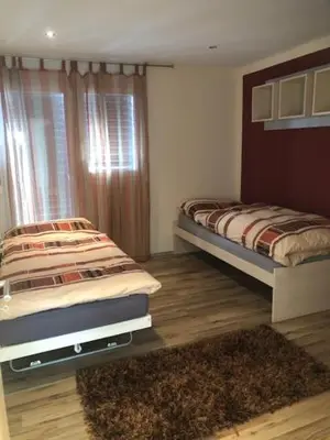 Ein Bett oder Betten in einem Zimmer der Unterkunft Chalet Charmj, Bettmeralp