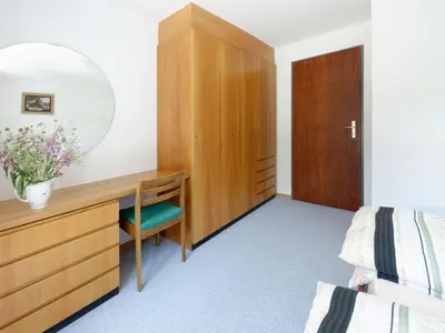 Ein Bett oder Betten in einem Zimmer der Unterkunft Apartment Hubertus-2 by Interhome