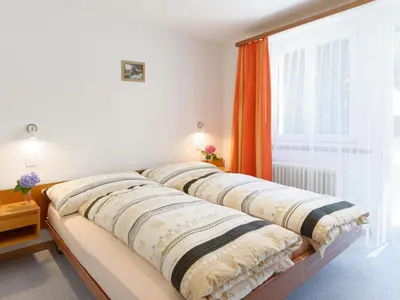 Ein Bett oder Betten in einem Zimmer der Unterkunft Apartment Hubertus-2 by Interhome