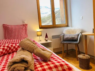 Ein Bett oder Betten in einem Zimmer der Unterkunft Chalet Sepp