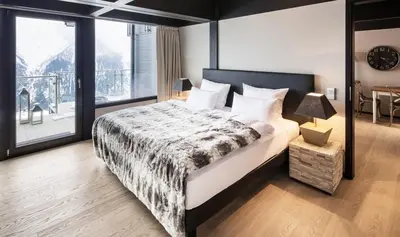 Ein Bett oder Betten in einem Zimmer der Unterkunft Lauchernalp Resort Residences