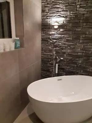 Ein Badezimmer in der Unterkunft Moderne Unterkunft mit Panoramablick auf Thunersee