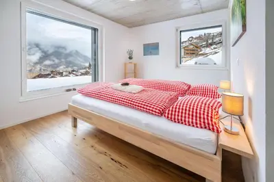 Ein Bett oder Betten in einem Zimmer der Unterkunft Schwarzhornblick