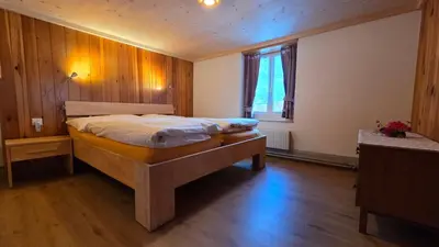Ein Bett oder Betten in einem Zimmer der Unterkunft Adlerhorst - Apartment im Niedersimmental