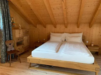 Ein Bett oder Betten in einem Zimmer der Unterkunft Ferienwohnung Talhaus
