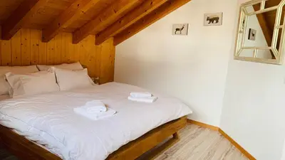 Ein Bett oder Betten in einem Zimmer der Unterkunft Ferienwohnung Talhaus
