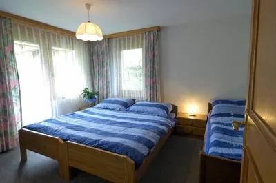 Ein Bett oder Betten in einem Zimmer der Unterkunft Haus Alpenglück