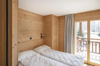 Ein Bett oder Betten in einem Zimmer der Unterkunft Polaris 1 005 - LUXE & SKI LIFT apartment 6 pers