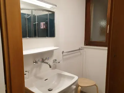 Ein Badezimmer in der Unterkunft Tschuggen 4