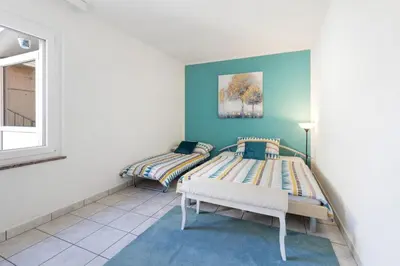 Ein Bett oder Betten in einem Zimmer der Unterkunft Cà da Sott