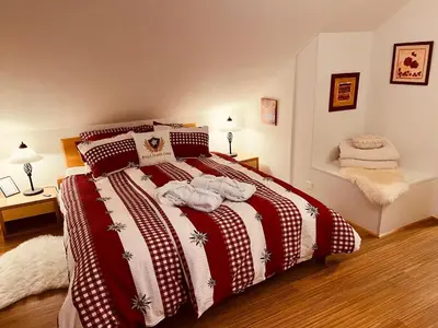 Ein Bett oder Betten in einem Zimmer der Unterkunft Engel Ingold Lodge Chalet 