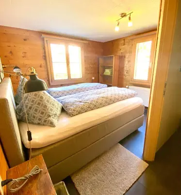Ein Bett oder Betten in einem Zimmer der Unterkunft Apartments Chalet Tatyana