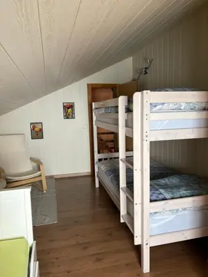 Ein Bett oder Betten in einem Zimmer der Unterkunft Gîte de Mase sur la rive droite du Val d'Hérens