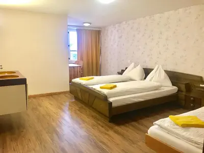 Ein Bett oder Betten in einem Zimmer der Unterkunft Interlaken Apartment 25