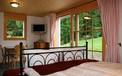 Ein Bett oder Betten in einem Zimmer der Unterkunft Sam & Cindy Mühlemann