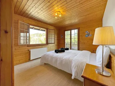 Ein Bett oder Betten in einem Zimmer der Unterkunft Chalet Albarose - Vercorin