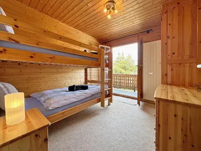 Ein Bett oder Betten in einem Zimmer der Unterkunft Chalet Albarose - Vercorin