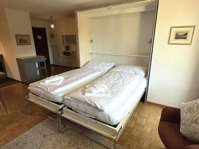 Ein Bett oder Betten in einem Zimmer der Unterkunft Royal 41