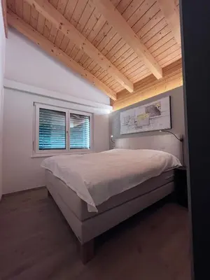 Ein Bett oder Betten in einem Zimmer der Unterkunft Residence Edelweiss No Stress by Eva